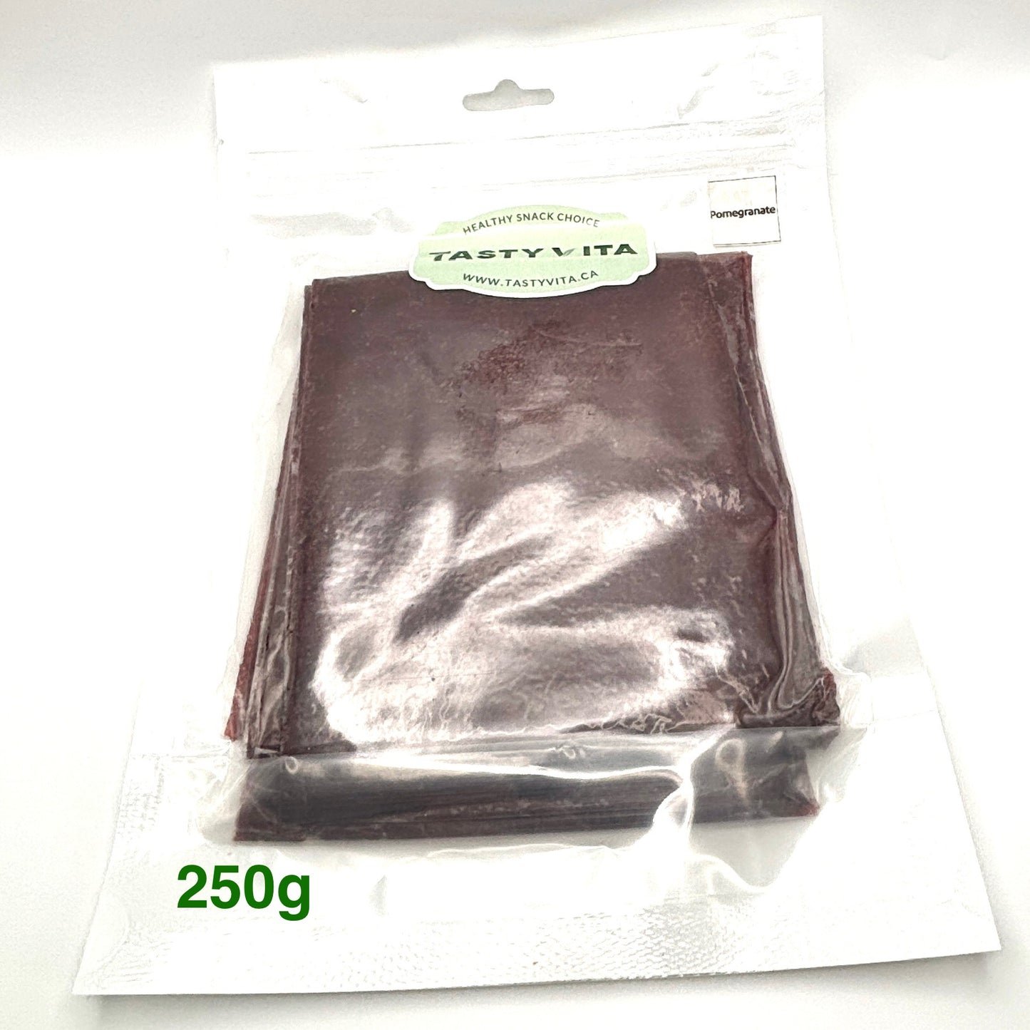 Tasty Vita pomegranate fruit leather rolls, Iranian Lavashak, handmade fruit roll-ups, no sugar natural fruit snack, vegan, vegetarian snack in Canada & the US.