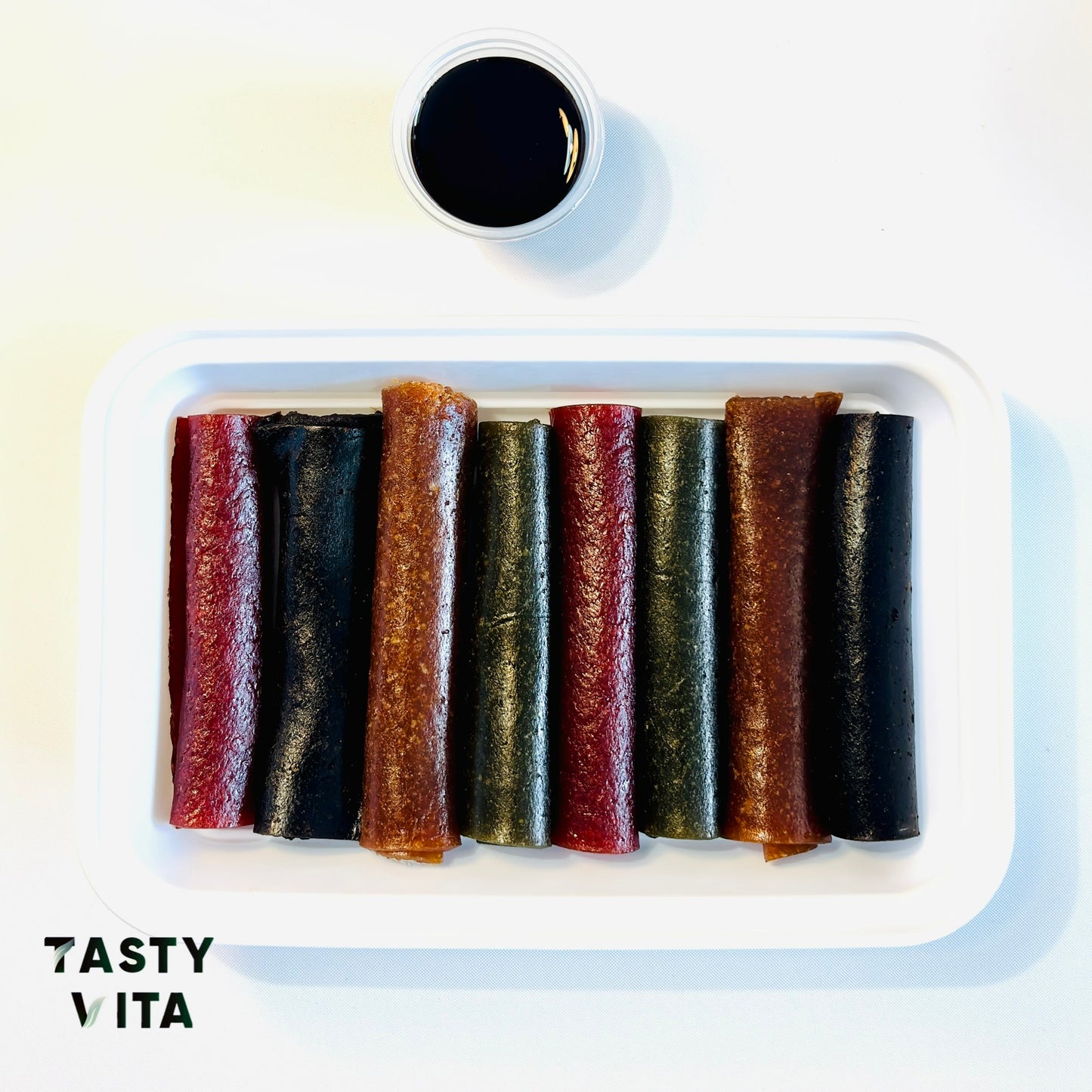 Assorted Rolled Fruit Leather with Lavashak Sauce