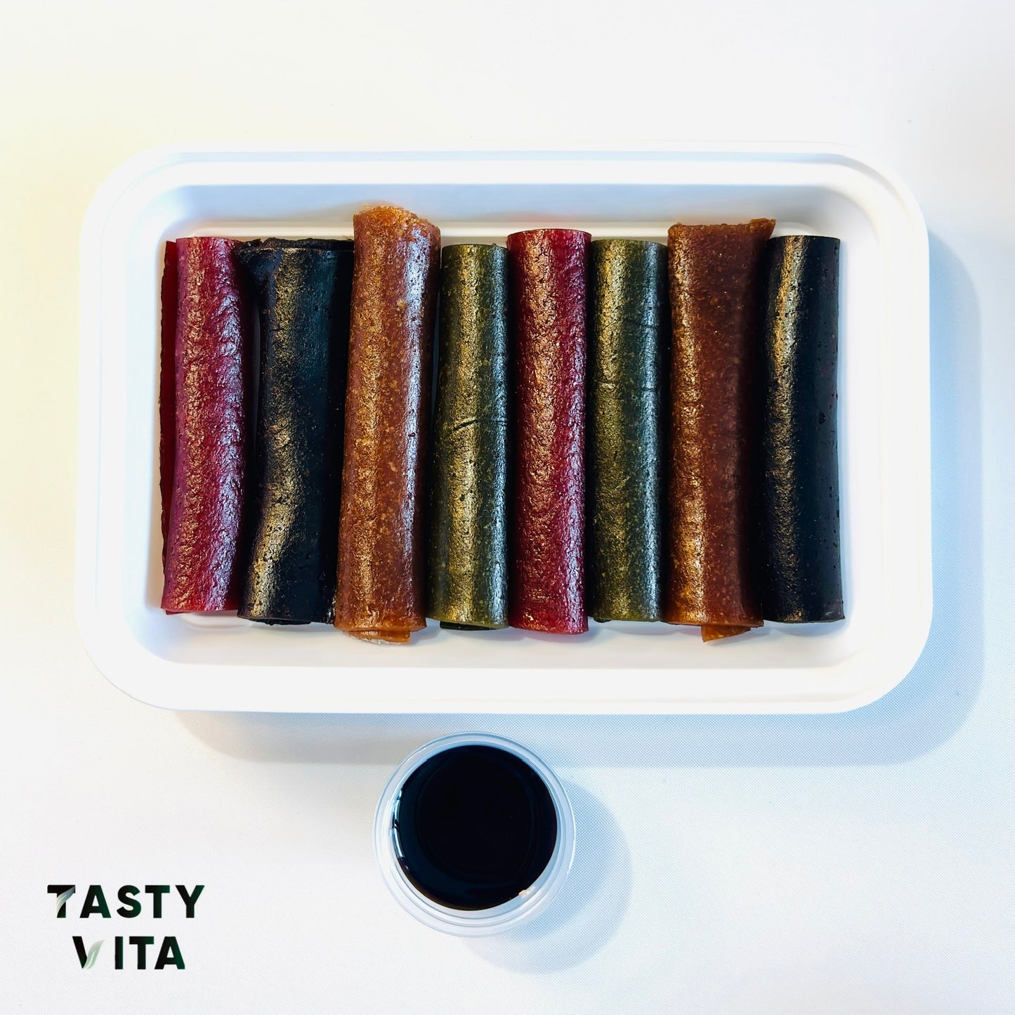 Assorted Rolled Fruit Leather with Lavashak Sauce