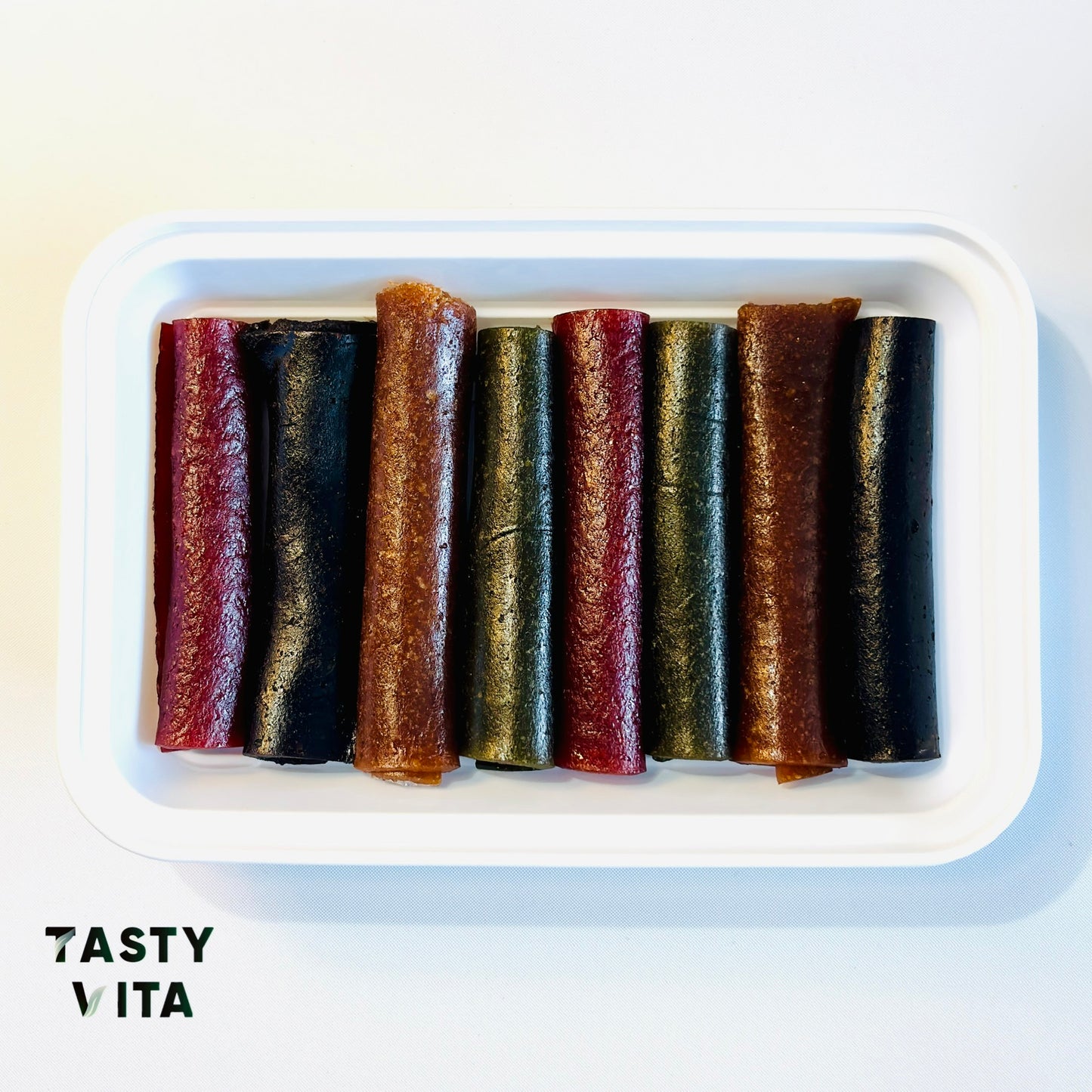 Assorted Rolled Fruit Leather with Lavashak Sauce