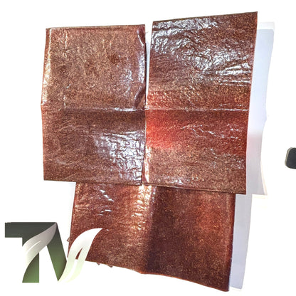 Traditional Persian sour plum fruit leather roll