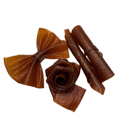 Sour wild plum fruit leather roll (Aloocheh Jangali Lavashak) on white background