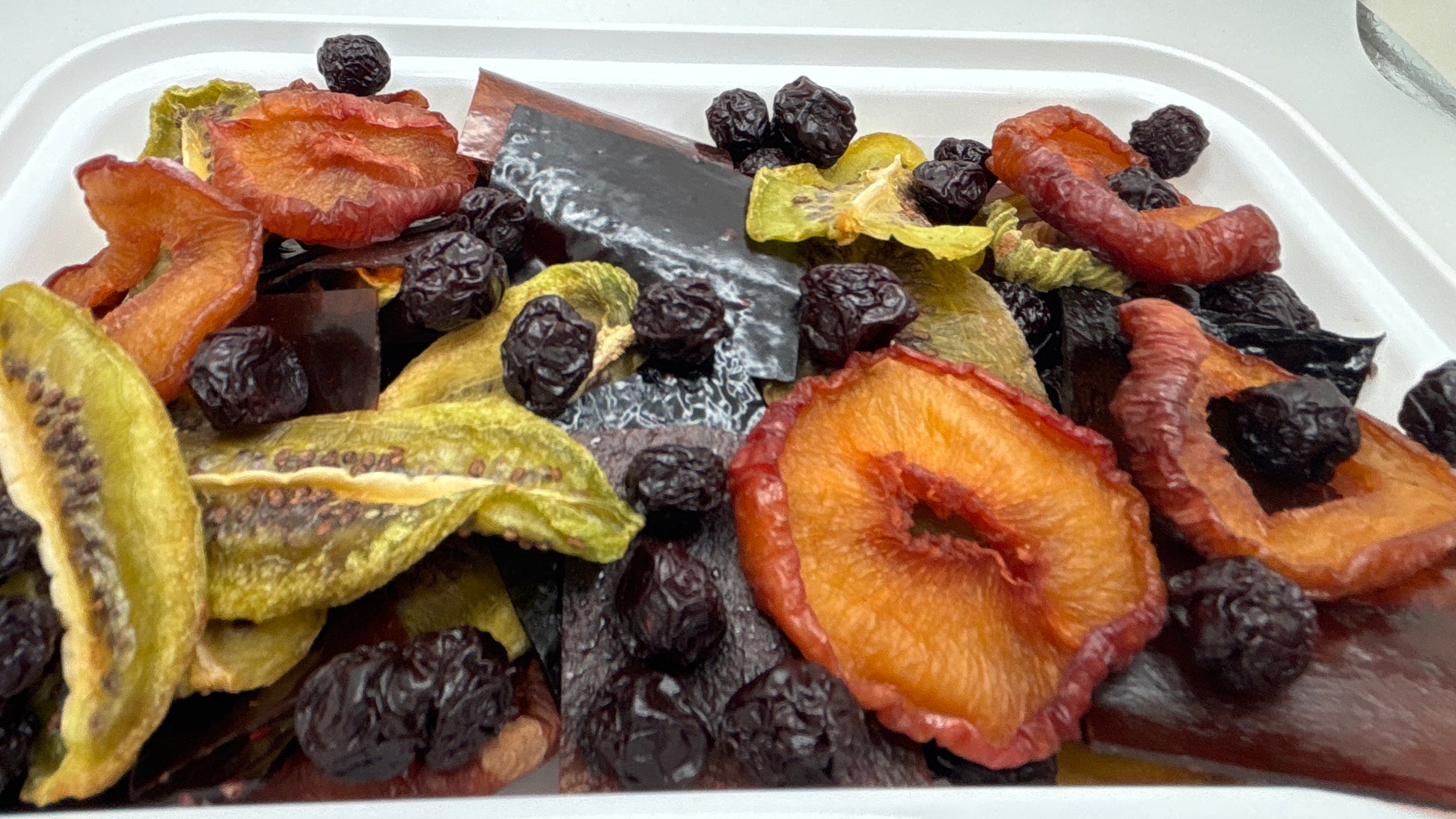 fruit snack pack, natural fruity delights, Tasty Vita dehydrated fruits treat in Canada, dried kiwi, pear, sour cherry, fruit leather, fruit rolls, sour snack, delicious, dry fruits shop in Vancouver