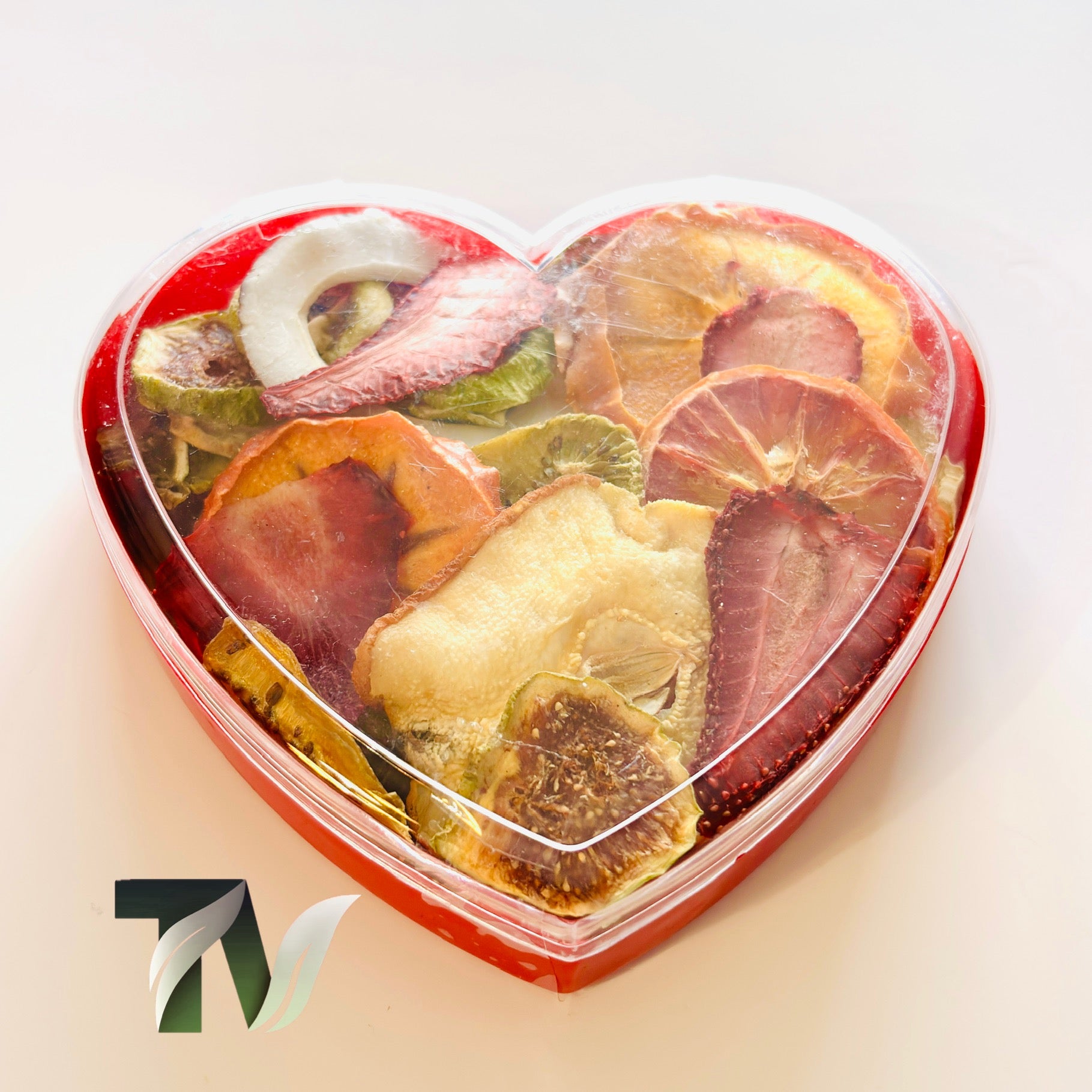 Natural mixed dried fruit gift box in a clear heart container — vegan, gluten-free, and beautifully arranged.
