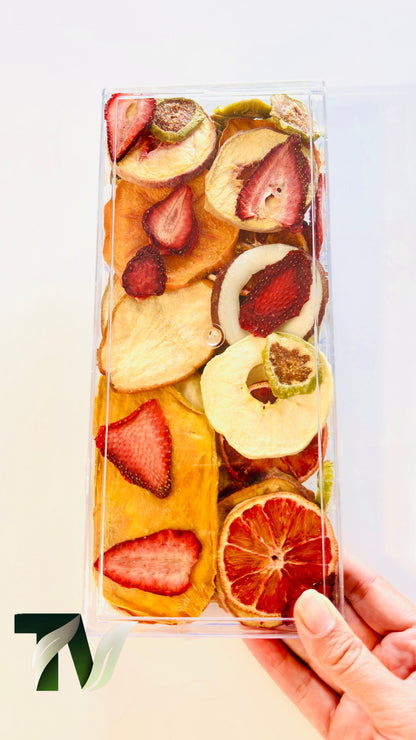 Premium clear gift box of assorted dried fruits — beautiful edible gift for holidays or special occasions.