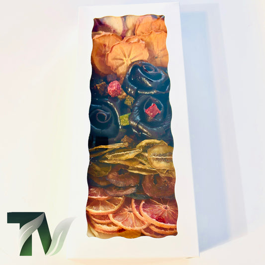 Elegant Rose-Shaped Fruit Leather and Premium Dried Fruits Gift Box by Tasty Vita, featuring Persian Lavashak roses, dried kiwi, orange, persimmon, peach, and colorful fruit cubes, beautifully arranged in a white box.