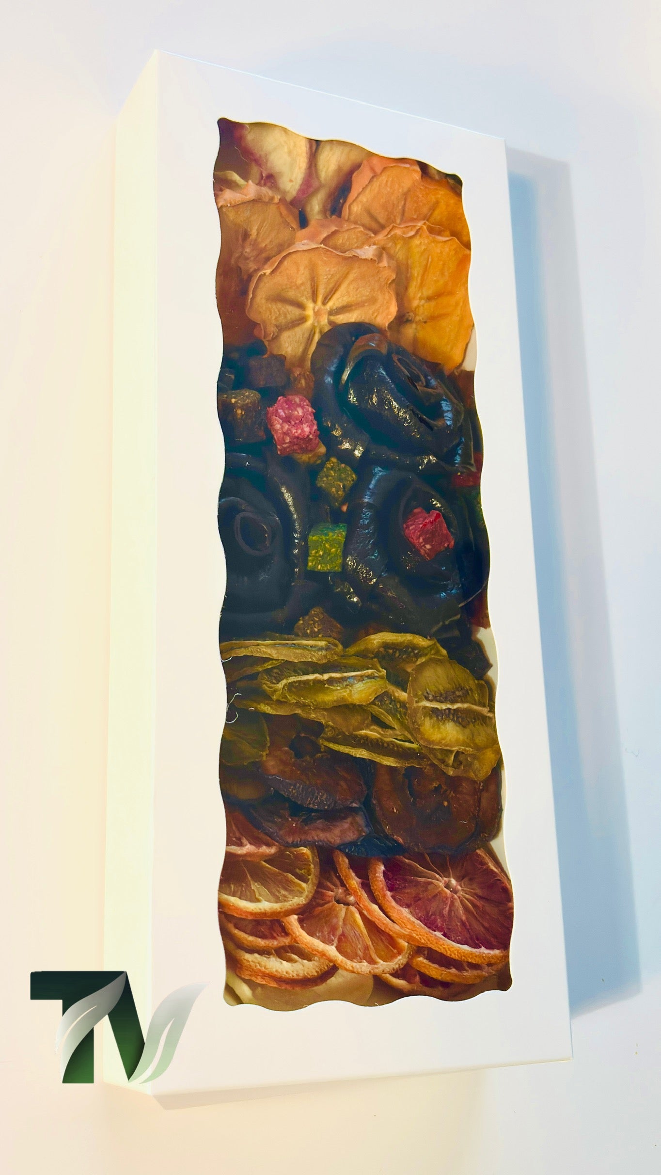 Beautifully arranged dried fruit and Lavashak rose box with mixed natural fruits including orange slices, banana, kiwi, and handcrafted fruit leather roses — perfect healthy vegan gift idea.