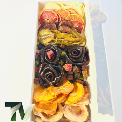 Elegant Rose-Shaped Fruit Leather and Premium Dried Fruits Gift Box by Tasty Vita, featuring Persian Lavashak roses, dried kiwi, orange, persimmon, peach, and colorful fruit cubes, beautifully arranged in a white box.