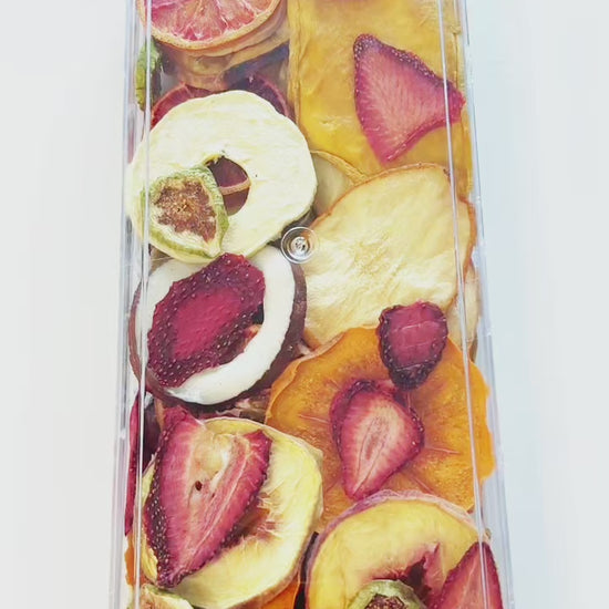 Premium clear gift box of assorted dried fruits — beautiful edible gift for holidays or special occasions.