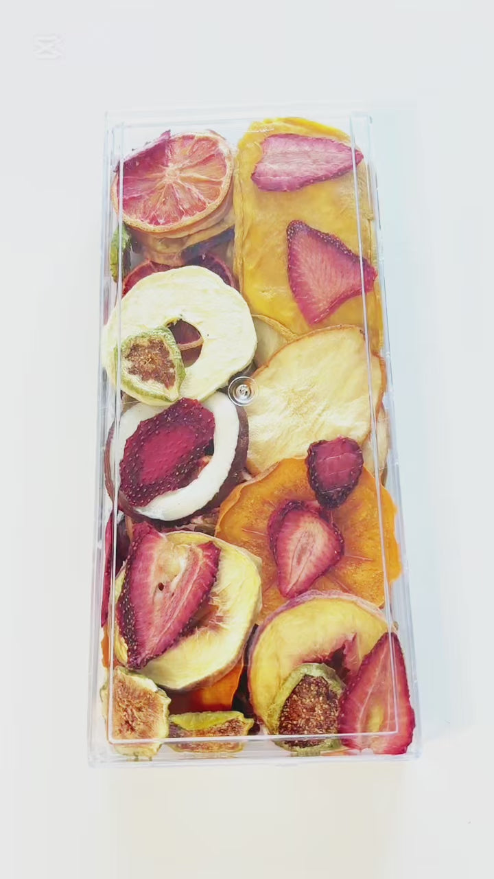 Premium clear gift box of assorted dried fruits — beautiful edible gift for holidays or special occasions.